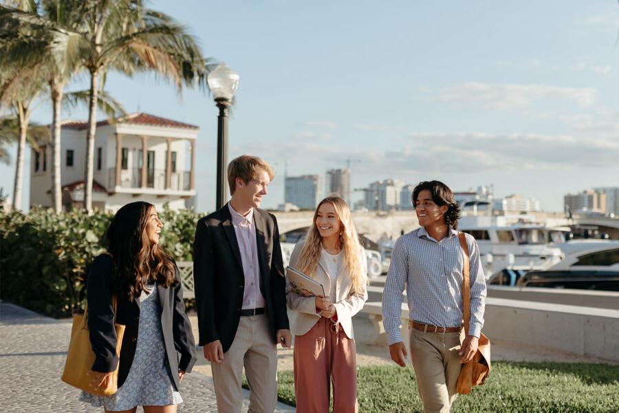 master of business administration mba students walk near the intercoastal waterway in 西<a href='http://snsnj.district4promotions.com'>推荐全球最大网赌正规平台欢迎您</a>.